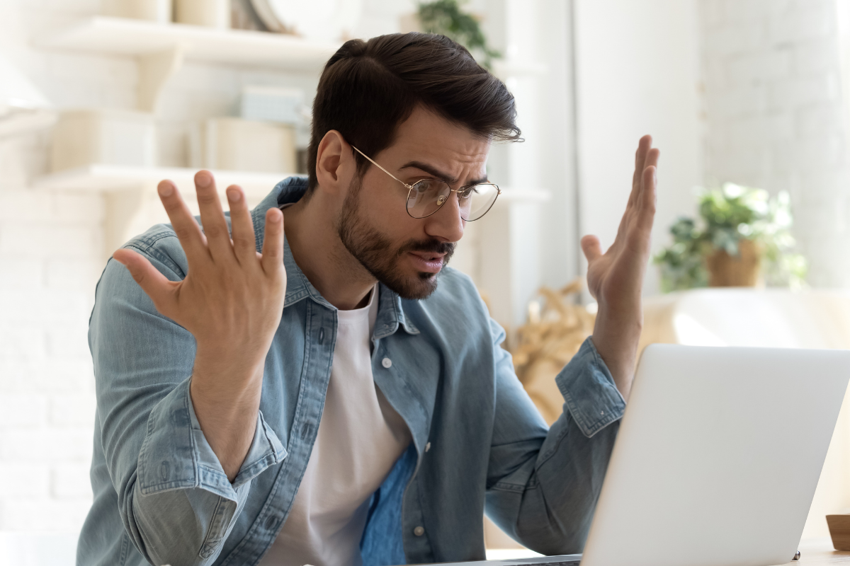 Healthcare administrator reviewing a hard-to-read merchant processing statement